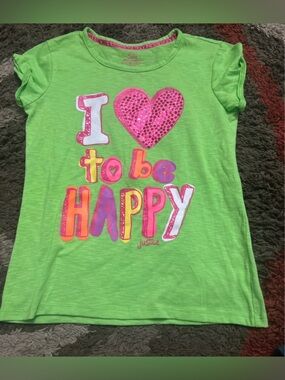 Justice girl’s green shirt size 14